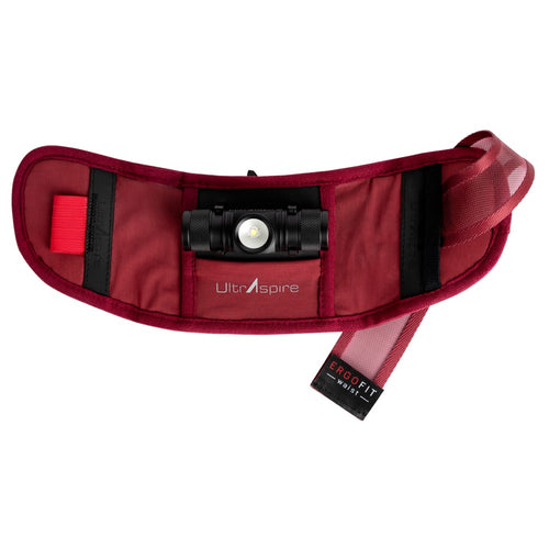 Front view of the UltrAspire Lumen Ally waist belt attachment in burgundy