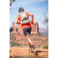 Back view of runner wearing UltrAspire Big Bronco 2.0 race vest in desert sage colour