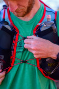 Front view of runner wearing UltrAspire Big Bronco Race Vest