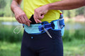 Front on-model view of UltrAspire Speedgoat 3.0 waist pack in lagoon/navy